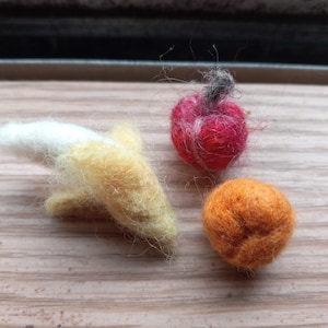 Tiny fruit- apple, orange and banana