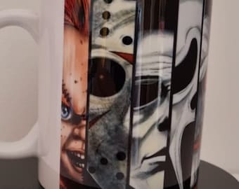 May include: White ceramic coffee mug with a black and white graphic print of four horror movie characters. The characters are Freddy Krueger, Jason Voorhees, Michael Myers, and Ghostface.