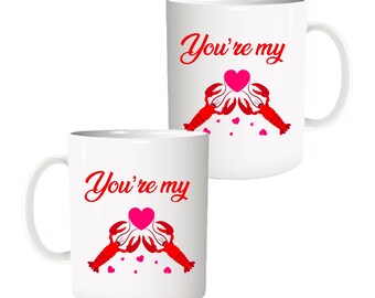 May include: Two white mugs with red and pink lobster designs and the text "You're my" on each mug.