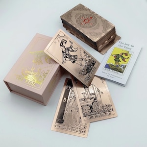 Jeu de tarots en or rose, jeu de cartes de tarot avec guide, coffret cadeau de luxe.