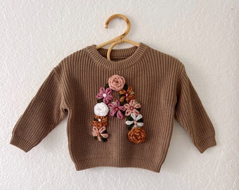 Custom initial flower design embroidered baby and toddler knit sweater