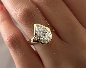 3 Carat Pear Cut Lab Grown Diamond Ring in 14K Yellow Gold Bezel Setting