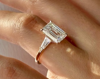 5 Carat Emerald Cut Lab Grown Diamond and Tapered Baguette Three Stone Ring in Rose Gold