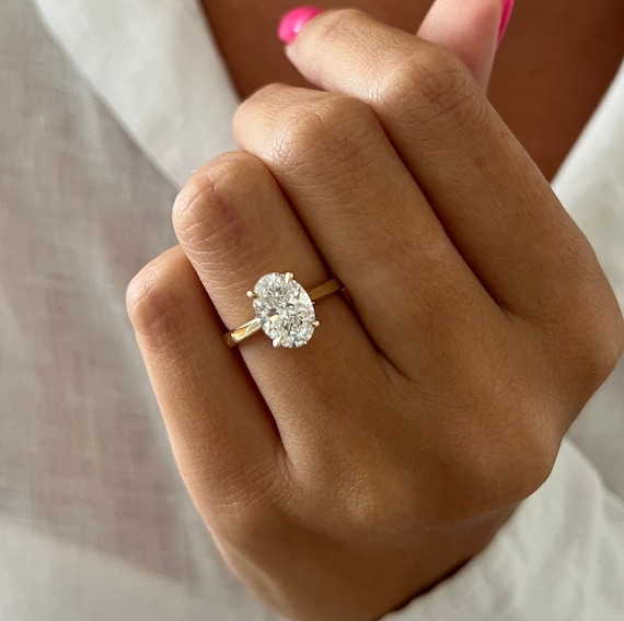 Hidden halo engagement ring oval best sale