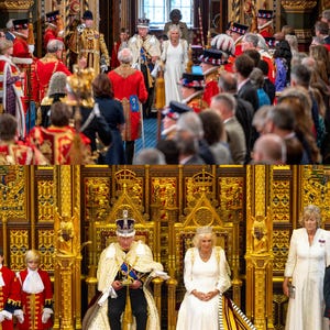 May include: A formal ceremony with individuals in ceremonial dress, including crowns and robes. The setting is a grand hall with elaborate gold detailing and a large window. The image captures a moment of historical significance, with many people in attendance.