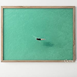 A gril swimming into the ocean canvas wall art a woman floating on the pool oil painting on canvas large green sea oil painting decor