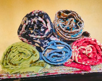 May include: Five kantha quilts rolled up and stacked on top of each other. The quilts are made of cotton fabric and have a variety of colors and patterns. The quilts are all hand-stitched and have a unique, rustic look.