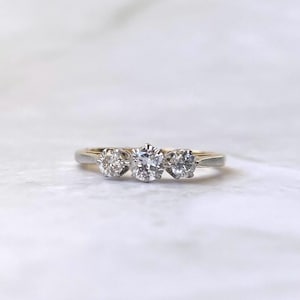Antique 18k gold and platinum old cut diamond trilogy ring