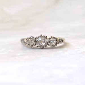 Antique 18k gold and platinum old cut diamond trilogy ring