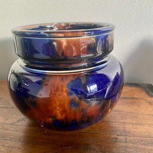 Blue and honey brown drip glaze tobacco jar with lid. Vintage/antique.