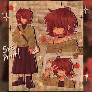 May include: A 5x6 print featuring a cartoon character with red hair and a green cardigan. The character is depicted in three different poses, with an apple-shaped bag and necklace. The background has a vintage aesthetic with apple and flower illustrations.