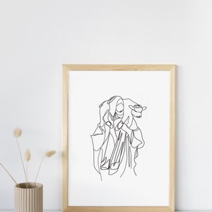 May include: A black and white line drawing of a person carrying a lamb on their shoulder. The drawing is framed in a light wood frame and is hanging on a white wall.