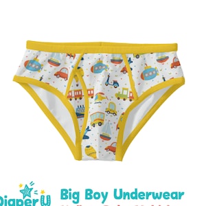 May include: White underwear with a yellow trim and a pattern of colorful vehicles, including cars, trains, boats, and airplanes. The text "Diaper U" and "abdl metaverse" is printed below the image.