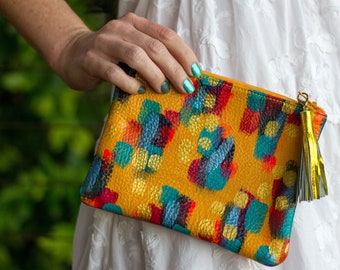 Yellow leather zippered clutch purse