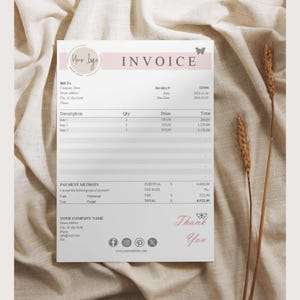 May include: A minimalist invoice template with a pink butterfly design. The invoice includes a section for billing information, a table for itemized costs, and a section for payment methods. The invoice also includes a subtotal, tax rate, tax amount, and total.