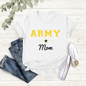 May include: White t-shirt with the text "ARMY Mom" in yellow and black lettering. A black star is above the word "Mom".