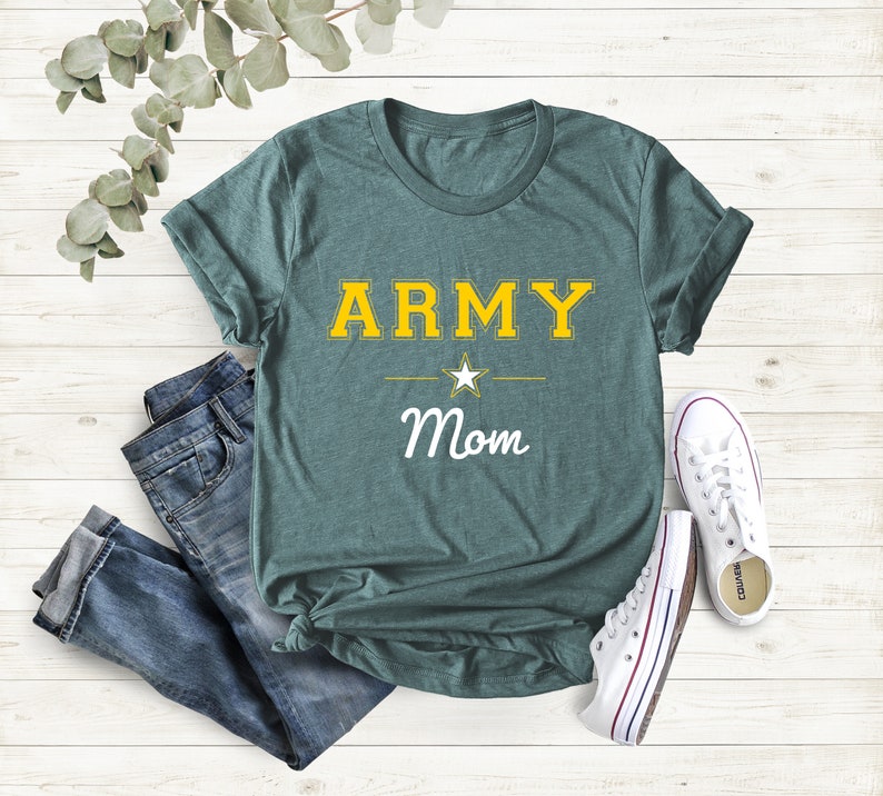 May include: Teal blue t-shirt with the text "ARMY Mom" in yellow and white lettering. A white star is between the words "ARMY" and "Mom".