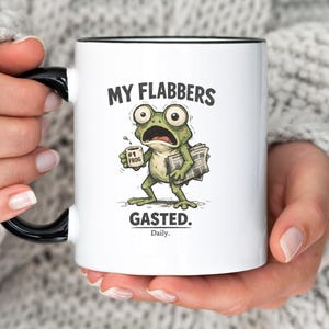 Funny frog coffee mug with text “My Flabbers Gasted,” quirky frog holding coffee cup, humorous weirdcore ceramic mug.