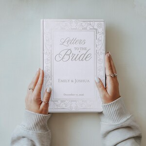 Personalized Letters to the Bride book featuring an elegant custom bride journal design with sophisticated typography. This beautiful bridal shower guest book serves as a sentimental bridal shower book, a precious wedding journal, and a unique bride's notebook.