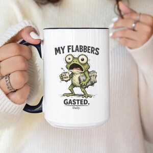 Funny frog coffee mug with text “My Flabbers Gasted,” quirky frog holding coffee cup, humorous weirdcore ceramic mug.