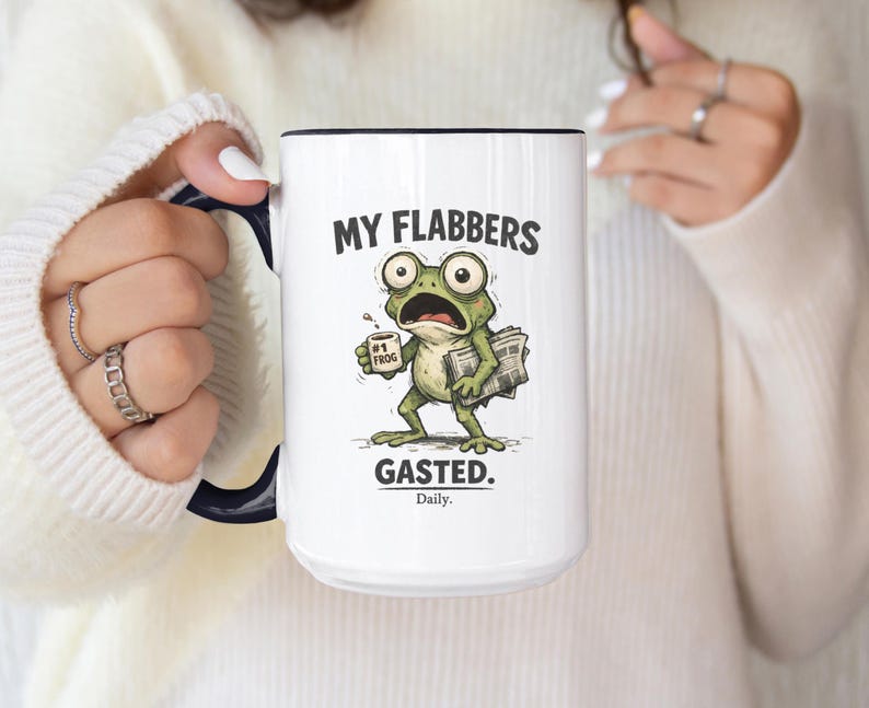 Funny frog coffee mug with text “My Flabbers Gasted,” quirky frog holding coffee cup, humorous weirdcore ceramic mug.