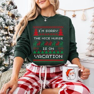 A Funny Nurse Gift sweatshirt, designed like an Ugly Xmas Sweater, with the sarcastic phrase "I'm Sorry The Nice Nurse Is On Vacation." This is ideal for an RN LPN Nurse or ICU Nurse Gif