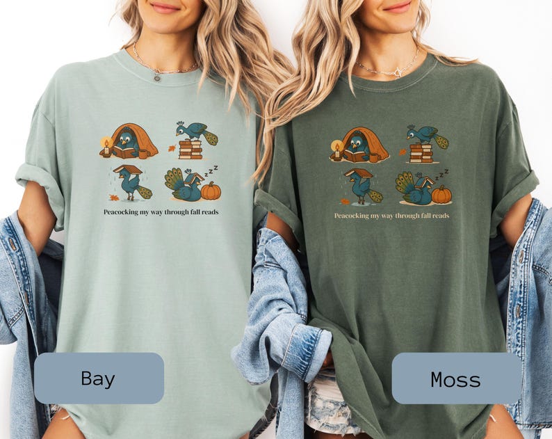 Comfort Colors shirt with whimsical peacock illustrations reading books, paired with pumpkins and cozy fall designs, perfect book lover tee.
Book Lover Comfort Colors Tee.nautumn gift for bookworms, librarians, teachers, and peacock lovers.
peacock shirt, funny peacock tee, peacock lover gift, book lover shirt, fall reading shirt, comfort colors tee, bookish shirt, librarian gift, cute peacock shirt, autumn book shirt, teacher gift tee, book club shirt, cozy fall shirt