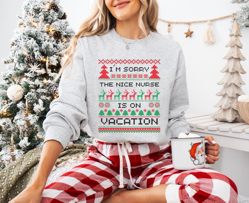 A Funny Nurse Gift sweatshirt, designed like an Ugly Xmas Sweater, with the sarcastic phrase "I'm Sorry The Nice Nurse Is On Vacation." This is ideal for an RN LPN Nurse or ICU Nurse Gif