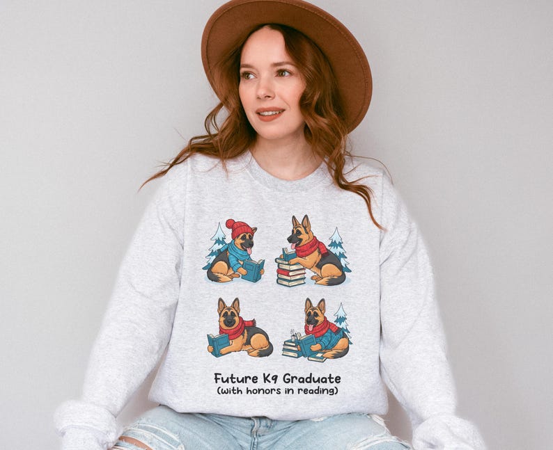 Future K9 Graduate Sweatshirt. This cozy German Shepherd shirt features four cute German Shepherds reading books, making it a perfect dog lover gift. It's an ideal bookish jumper and a great Xmas gift for dog moms and dog dads who love reading. This holiday sweatshirt is a funny and charming way to celebrate a love for dogs and books during the winter holiday season.