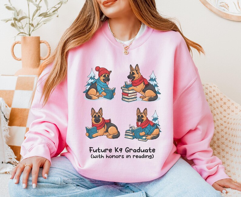 Future K9 Graduate Sweatshirt. This cozy German Shepherd shirt features four cute German Shepherds reading books, making it a perfect dog lover gift. It's an ideal bookish jumper and a great Xmas gift for dog moms and dog dads who love reading. This holiday sweatshirt is a funny and charming way to celebrate a love for dogs and books during the winter holiday season.