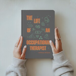 “Personalized Occupational Therapist Journal featuring orange and green design with medical icons, stethoscope, and bow illustration. Custom hardcover notebook gift for OT students, occupational therapists, and therapy professionals.”