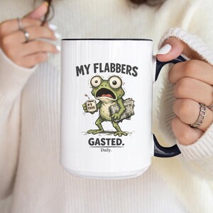 Funny frog coffee mug with text “My Flabbers Gasted,” quirky frog holding coffee cup, humorous weirdcore ceramic mug.