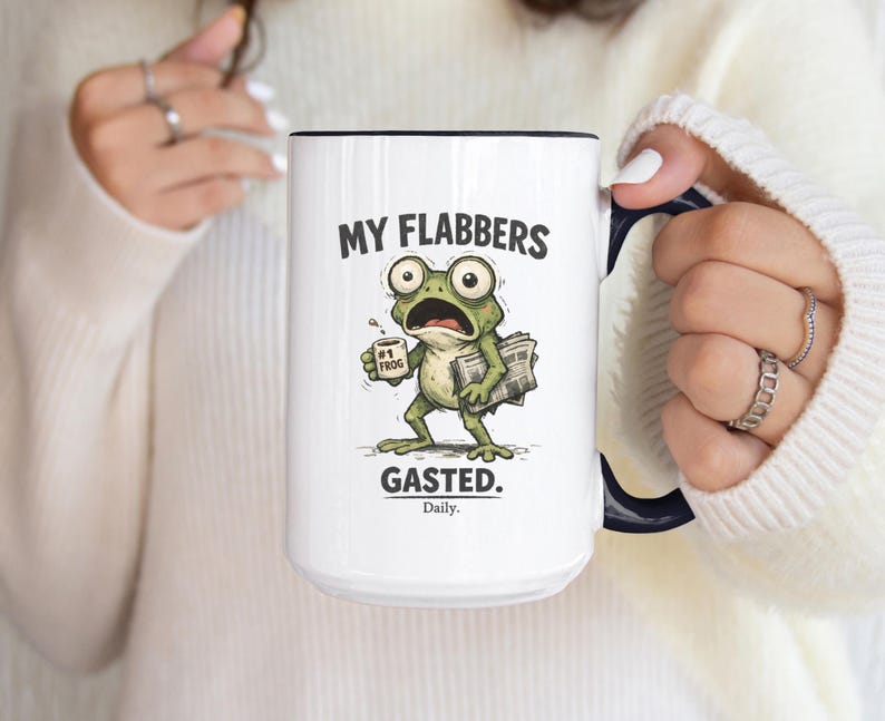 Funny frog coffee mug with text “My Flabbers Gasted,” quirky frog holding coffee cup, humorous weirdcore ceramic mug.