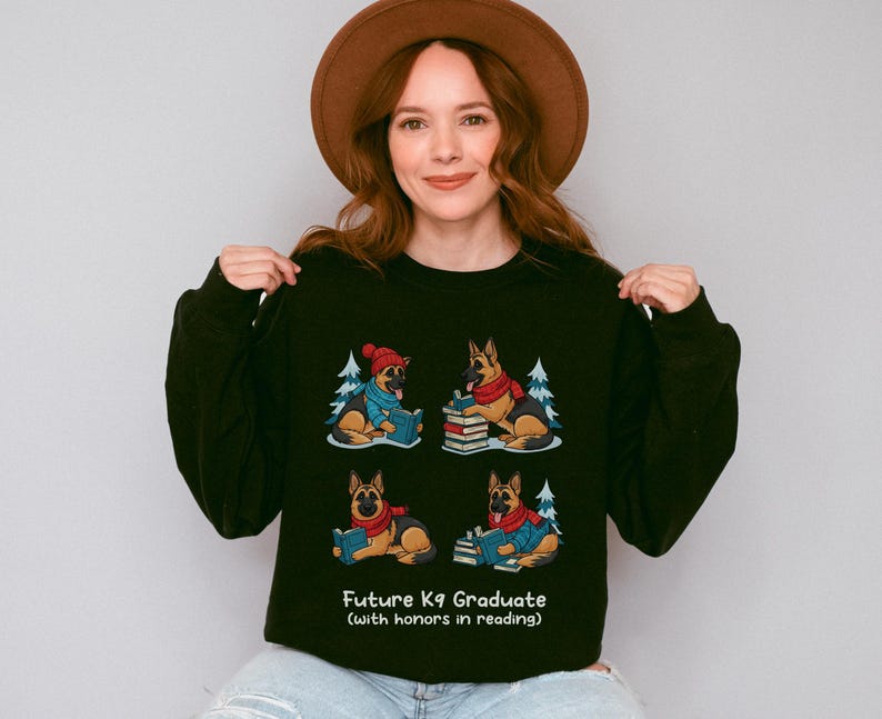 Future K9 Graduate Sweatshirt. This cozy German Shepherd shirt features four cute German Shepherds reading books, making it a perfect dog lover gift. It's an ideal bookish jumper and a great Xmas gift for dog moms and dog dads who love reading. This holiday sweatshirt is a funny and charming way to celebrate a love for dogs and books during the winter holiday season.
