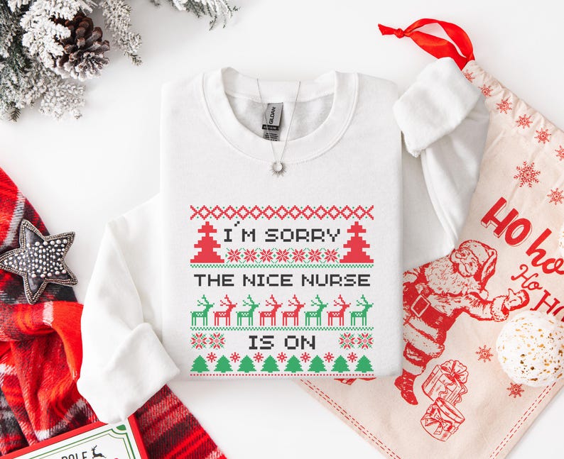 A Funny Nurse Gift sweatshirt, designed like an Ugly Xmas Sweater, with the sarcastic phrase "I'm Sorry The Nice Nurse Is On Vacation." This is ideal for an RN LPN Nurse or ICU Nurse Gif