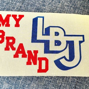 May include: A set of three ceramic mugs with a speckled, matte finish. The mugs are in shades of cream, light gray, and dark gray. Each mug has a simple, minimalist design and a rounded handle.