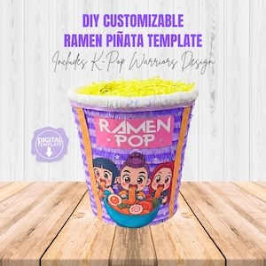 Puede incluir: Una plantilla de piñata ramen personalizable con un diseño K-Pop Warriors. La piñata morada presenta una pancarta "Ramen Pop" y una ilustración de dibujos animados de tres personajes comiendo ramen. La parte superior está llena de papel amarillo.