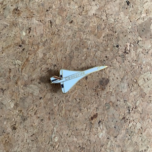Sleek white Vintage Concorde Lapel Pin