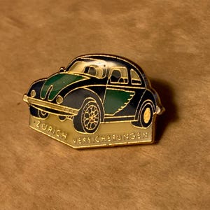 Classic enameled vintage green and black VW beetle car lapel pin