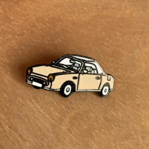 Retro Nissan Figaro sports car lapel pin