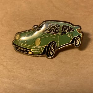 Elegant enameled lime green Porsche 911 car lapel pin