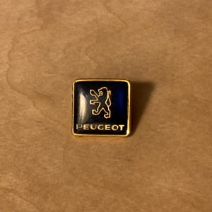 Classic enameled blue and silver &#39;Peugeot&#39; Lapel Pin