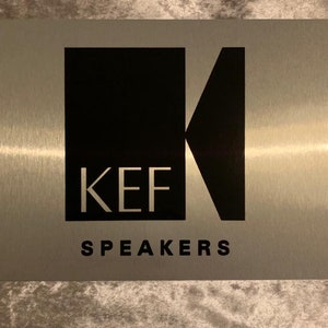 Kef Cinema Sign - brushed silver aluminium.