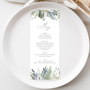 May include: A green and blue watercolor floral design menu card with the word "Meny" in cursive script. The menu lists the following courses: Forrett, Hovrett, Dessert, and Vin. The menu includes the following items: Havets delikatesser i kremet aspargessuppe (Torsk, Reker, Salmalaks), Langstidsstekt indrefilèt av okse Rosmarinstekte Amadinepoteter Pæresalat med parmesanost Smørstekte gulrøtter Rødvinssaus Lime- og myntemarinerte bringebær med Mascarponekrem Hvitvin-Anta Sofia Soave Rødvin - Santa Sofia Valpolicella Classico