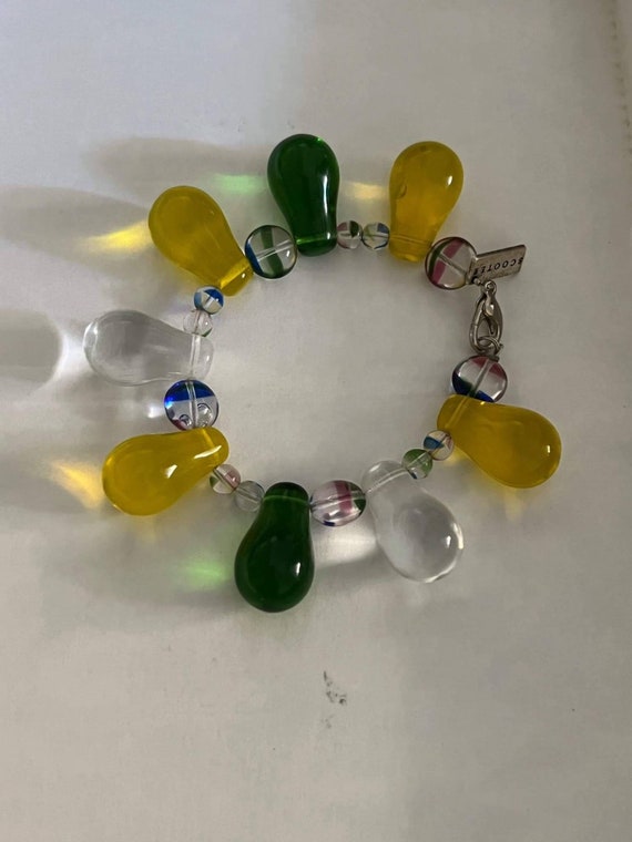 Bracelet perles de verre scooter Lancôme Vintage