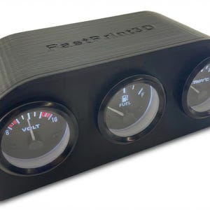 May include: Black automotive gauge cluster with three circular gauges. The gauges display volt, fuel, and temperature readings. The top of the cluster has the text "FastPrint3D".