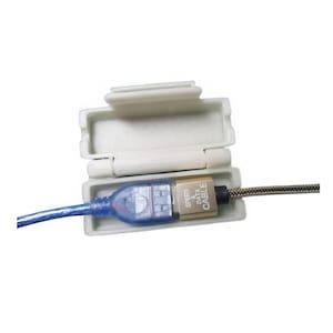 May include: A white, hinged plastic case holds a blue USB cable with a gold-coloured connector. The connector has the words "SPEED & DATA CABLE" printed on it. The cable is partially visible, with a silver braided section.