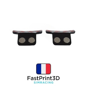 Op de afbeelding: Twee zwarte, T-vormige magnetische houders met zilveren ronde magneten. De houders hebben plakstrips aan de bovenkant. De afbeelding bevat ook de tekst "FastPrint3D SIMRACING" en een Franse vlag.