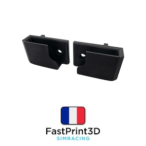 May include: Two black, rectangular brackets with a hollowed-out interior and a circular hole. The brackets are positioned side-by-side against a white background. The image also includes the text "FastPrint3D SIMRACING" below a French flag.