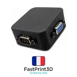 May include: Black rectangular electronic device with two connector ports. One port is a 9-pin D-sub connector, and the other is a 15-pin D-sub connector. The device has a textured surface. The image includes the text "FastPrint3D SIMRACING" and a French flag.